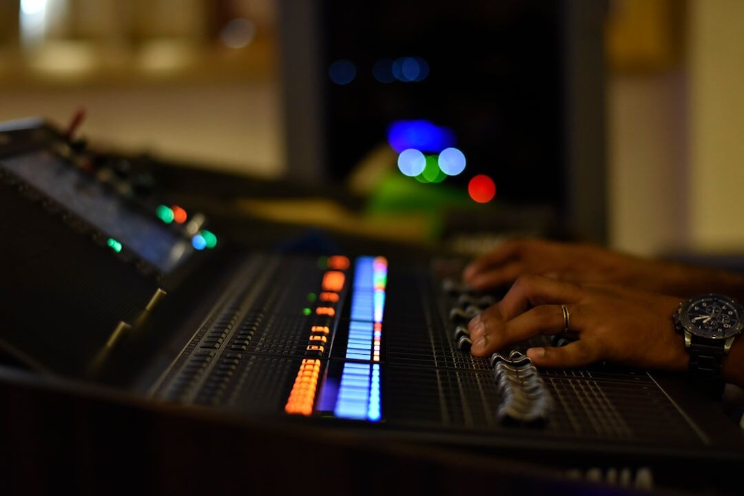 Sound engineer working at recording studio console