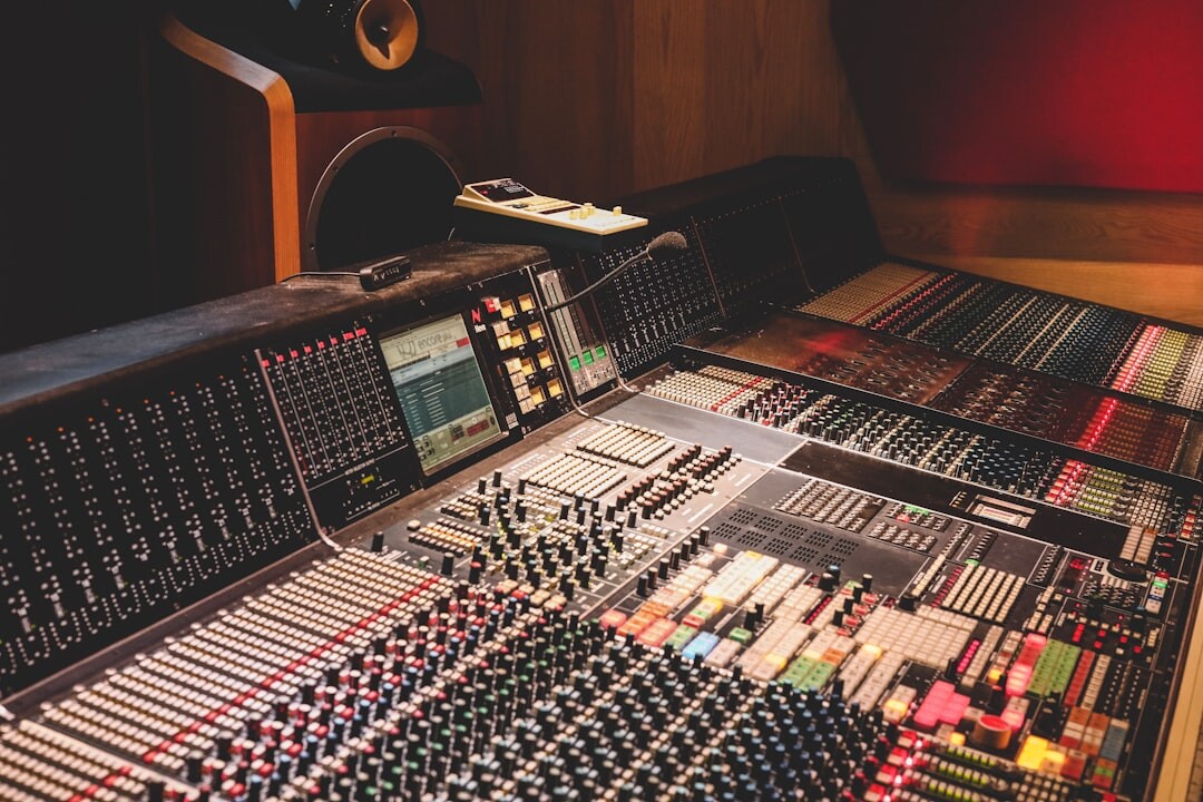 Professional recording studio with large mixing console